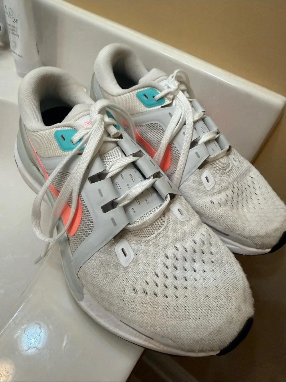 Nike Women’s White Running Shoes with Coral and Teal Accents